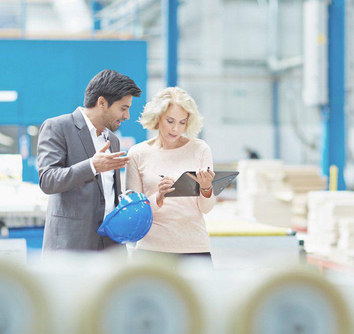 Manufacturing warehouse two workers